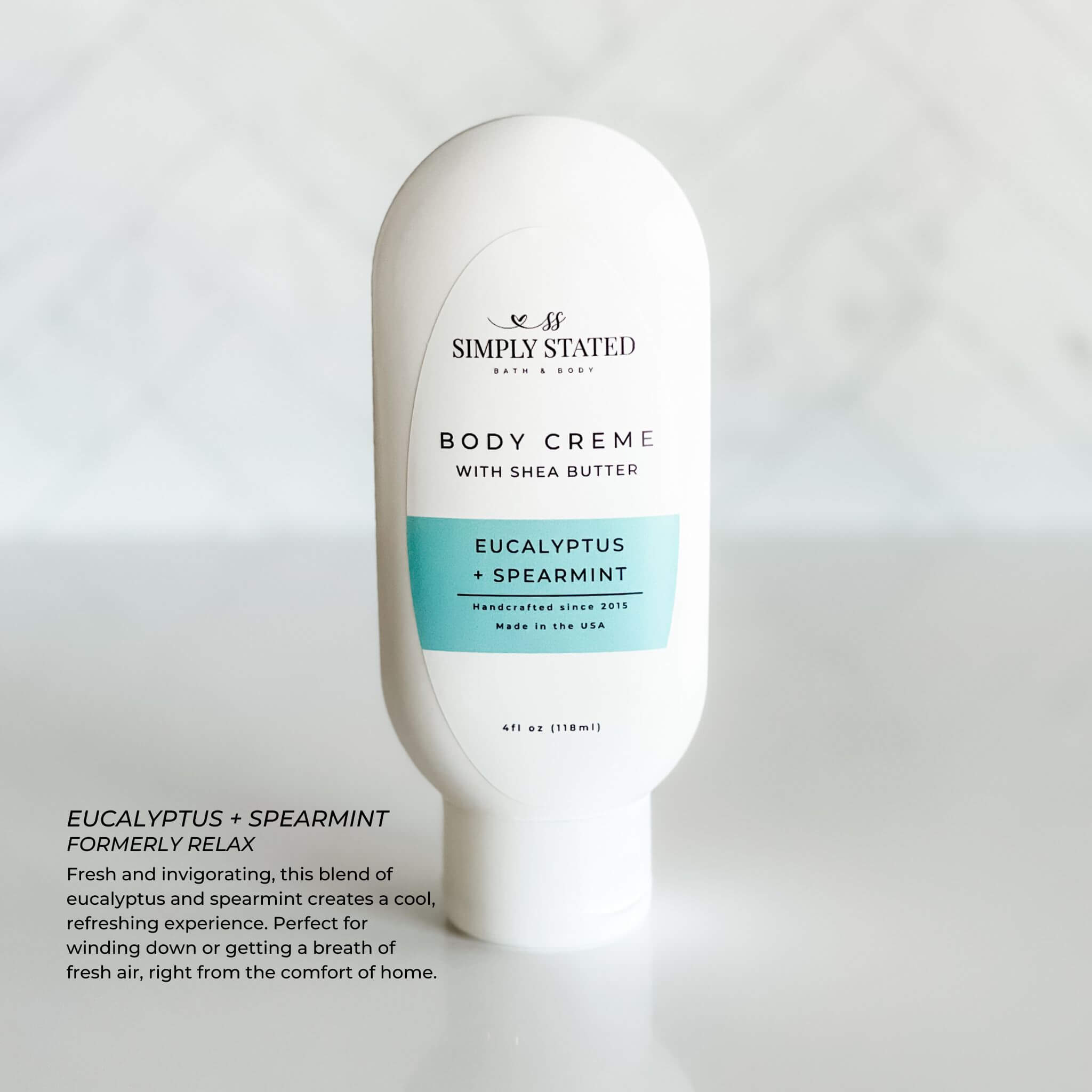 Simply Stated Bath & Body 4oz Aromatherapy Body Creme in Eucalyptus + Spearmint with new packaging. Fresh and invigorating, this creme creates a cool, refreshing experience. Perfect for relaxation or a breath of fresh air.