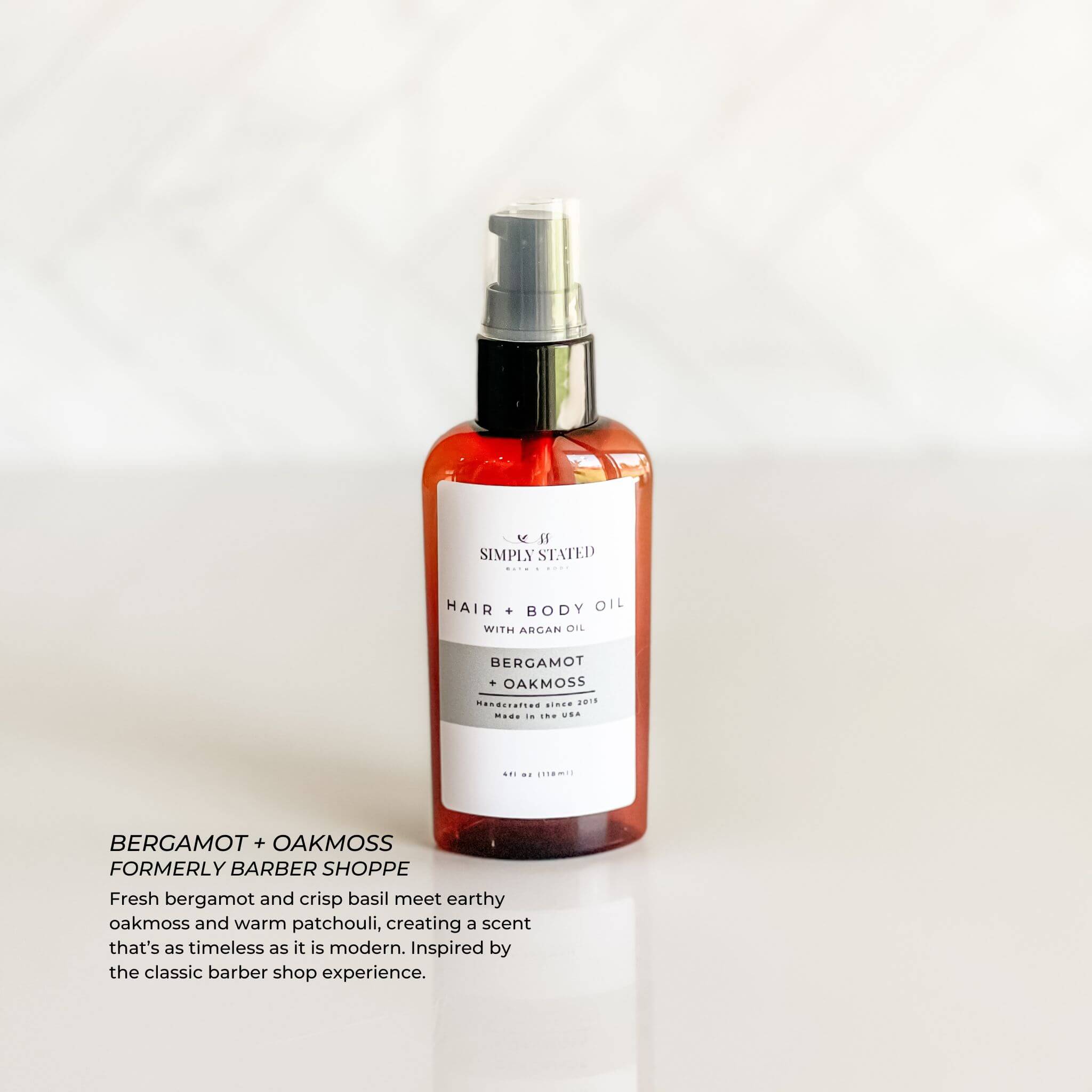 Bergamot + Oakmoss Men’s Beard + Body Oil in amber bottle with minimalist label