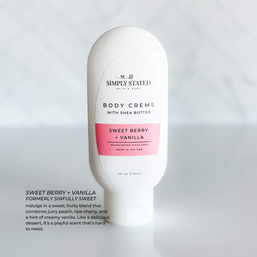 Simply Stated Body Creme in Sweet Berry + Vanilla scent. A 4oz squeeze bottle with shea butter and a fruity blend of juicy peach, ripe cherry, and creamy vanilla. A playful moisturizer perfect for everyday indulgence.