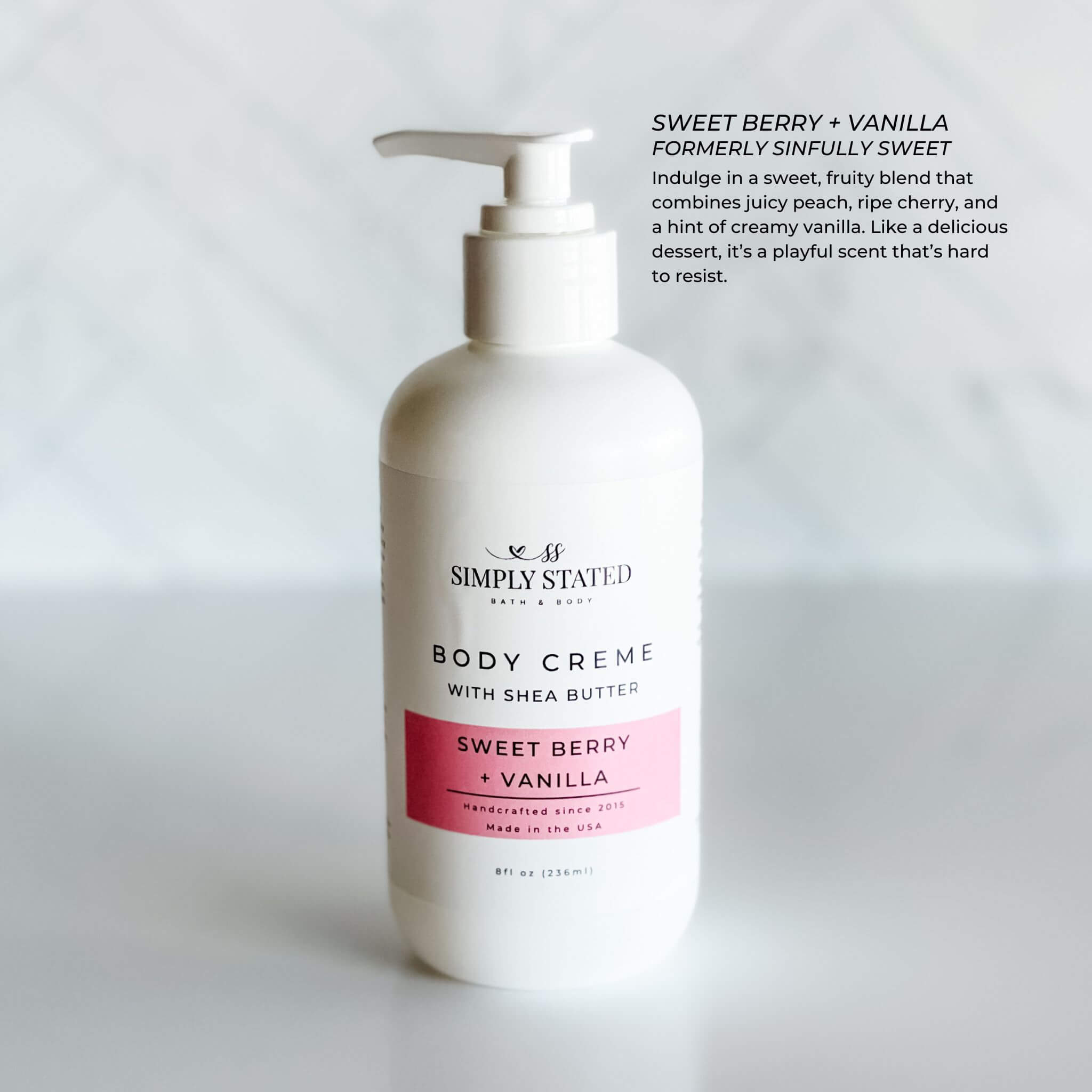 8oz pump bottle of Simply Stated Bath & Body Sweet Berry + Vanilla Body Creme with shea butter, featuring a fruity and sweet vanilla fragrance.