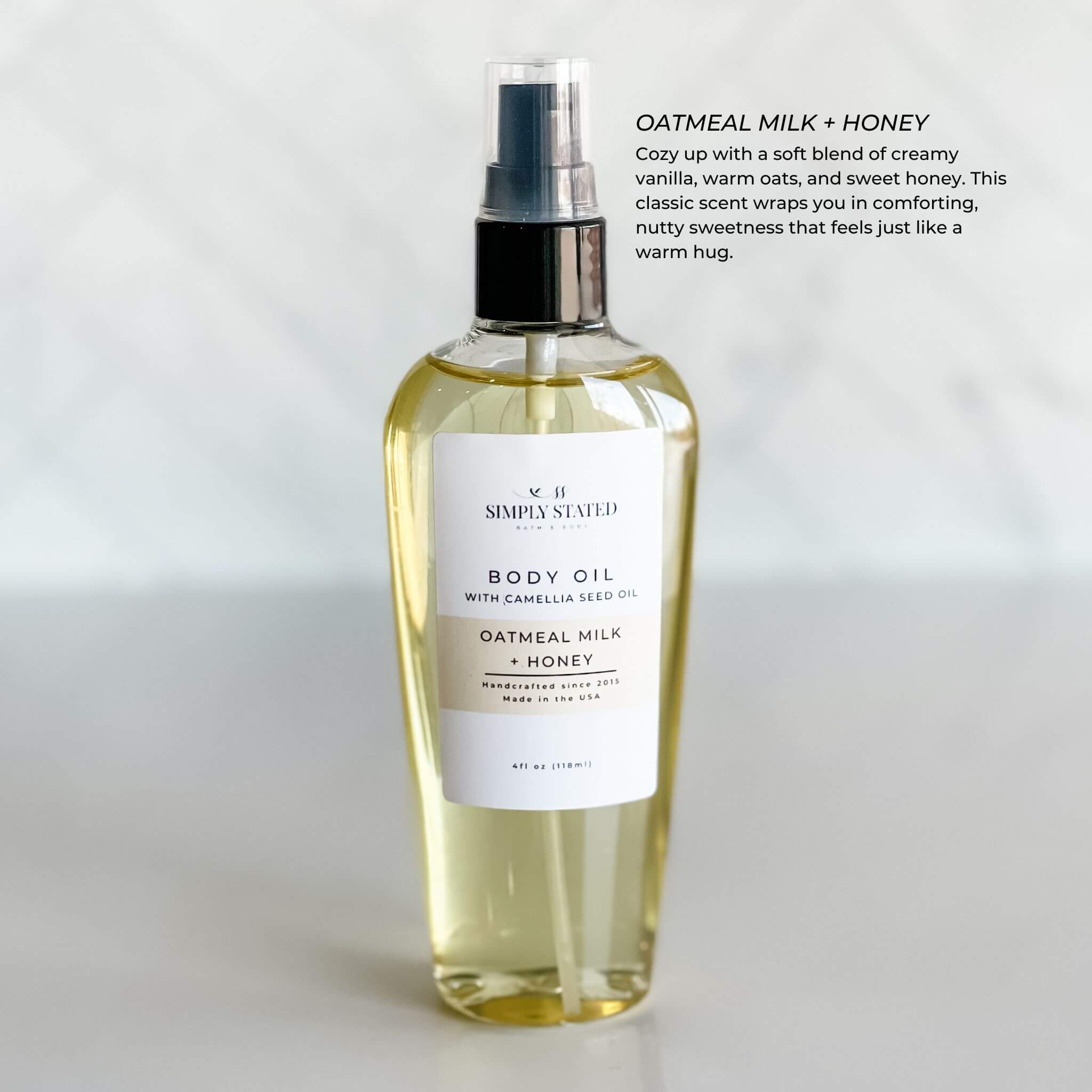 Simply Stated Bath & Body's Oatmeal Milk + Honey Body Oil in a 4oz bottle. Crafted with a warm blend of creamy vanilla, oats, and sweet honey for comforting hydration.