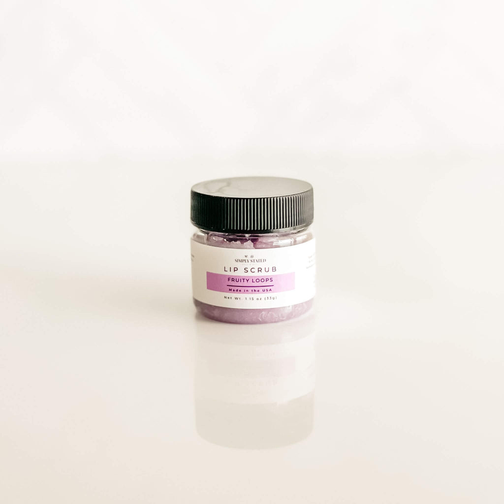 Vibrant purple Fruity Loops lip scrub in a jar, part of Simply Stated Bath & Body's playful and nostalgic lip care collection.