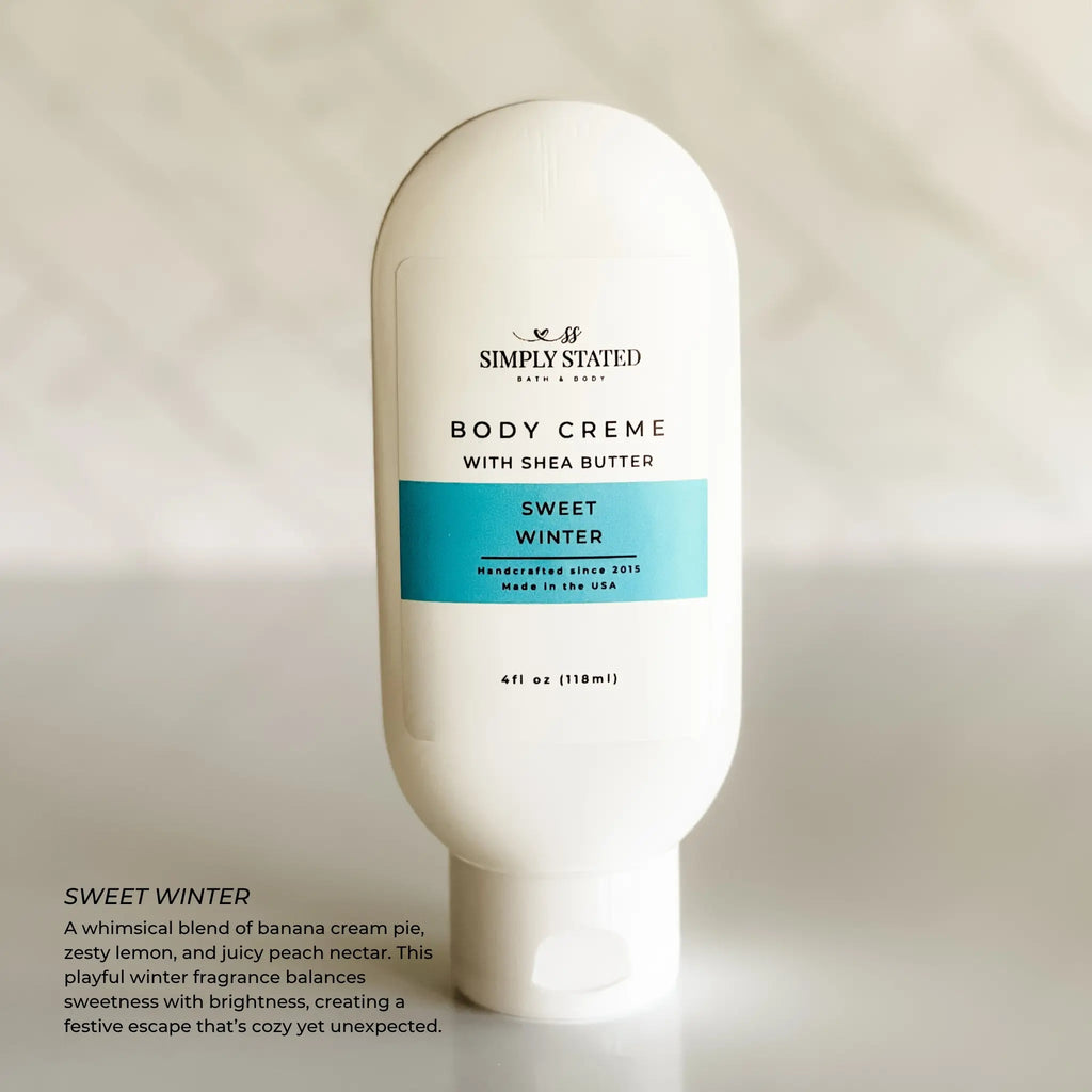 Body crème bottle labeled 'Sweet Winter' by Simply Stated on a light background